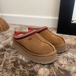 UGG Tasman Tan Suede Slip-Ons with Red Trim